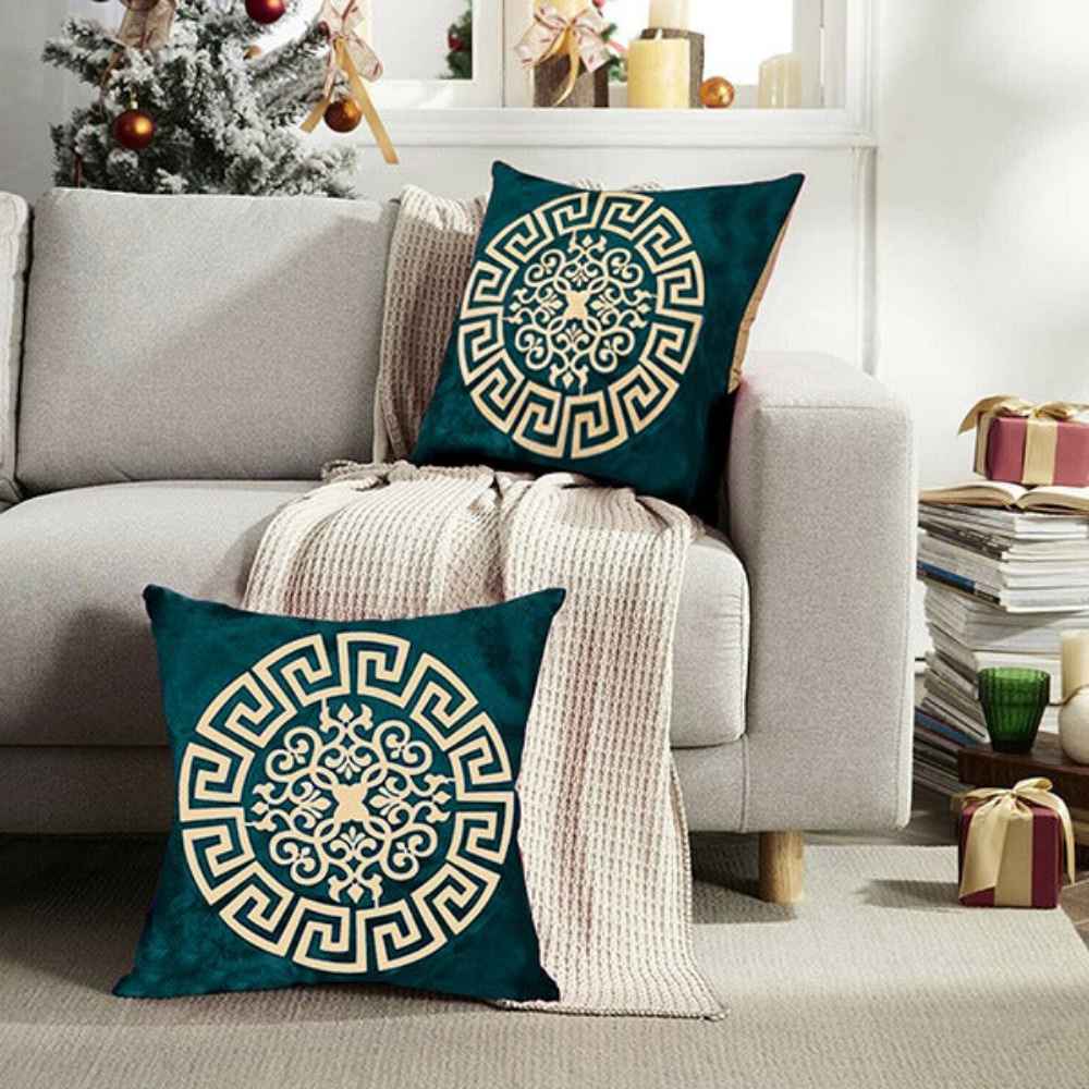 PAIR OF GREEN VELVET CUSHIONS